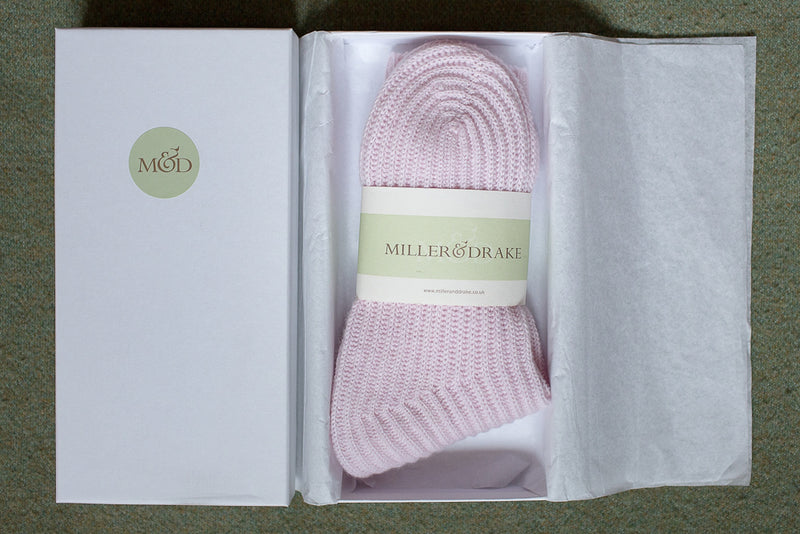 blush pink cashmere bed socks ribbed and soft 100% cashmere in a luxury white gift box and wrapped in tissue paper