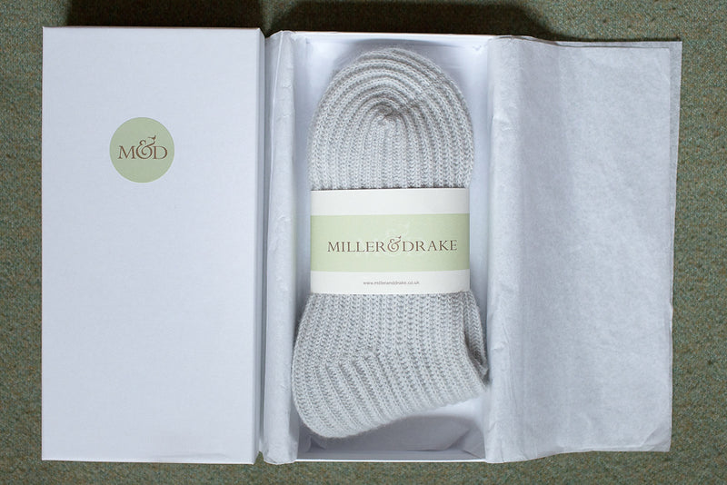 pumice grey cashmere bed socks ribbed and soft 100% cashmere in a luxury white gift box and wrapped in tissue paper